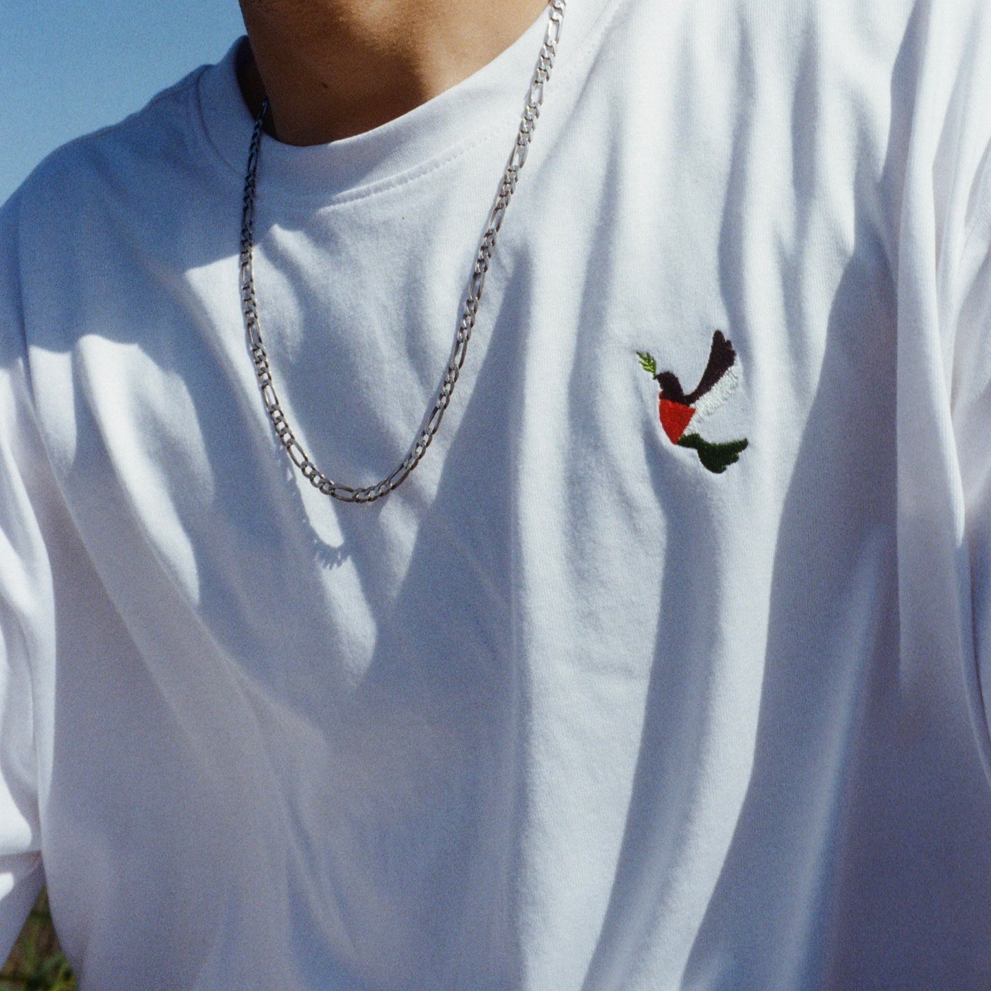 Unisex T-Shirt with Embroidered Detail | Stand with Palestine – Stand with Humanity